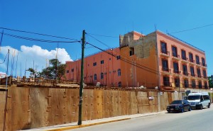 Hotel Playa Del Carmen on 20th Ave with new story added and construction next to it.