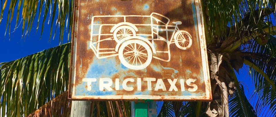 Tricycle taxis sign.