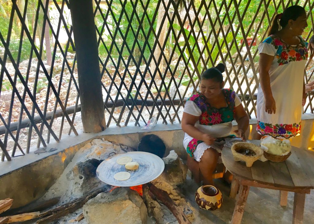 Mayans making tortillas