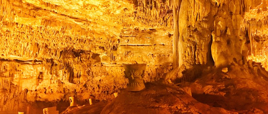 Discover the Balankanche Caves with artifacts near Chichen Itza