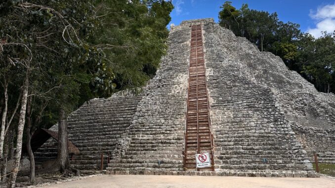 Coba ruins climbing pyramid